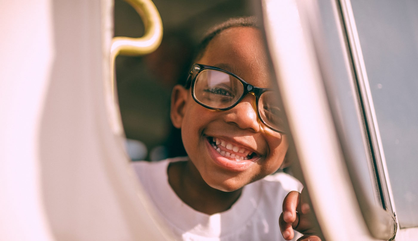 smiling with glasses